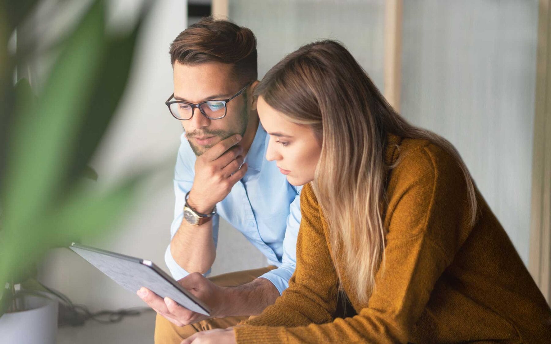 Couple researching superannuation